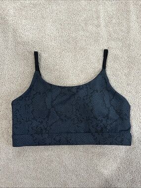 All Fenix charcoal snake-print sports bra with adjustable straps